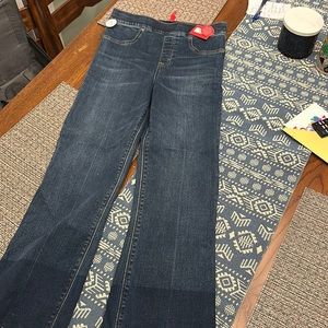 Spanx cropped flare denim jeans. Stretchy, dark blue. Size small.